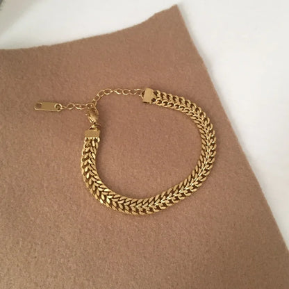 Elegant Twist Gold Bracelet